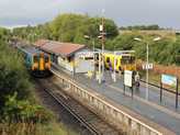 A vonal msik vge Bidston, itt lehet tszllni  a Merseyrail jrataira. Valaha ez egy nagy lloms volt s a nagyvast tovbbvezett Seacombe/New Brighton fel, de az a kapcsolat mra megsznt, az ruszlltssal egytt